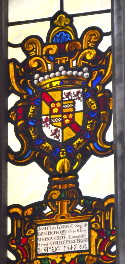 Detail from Great Hall heraldry window showing Golden Fleece